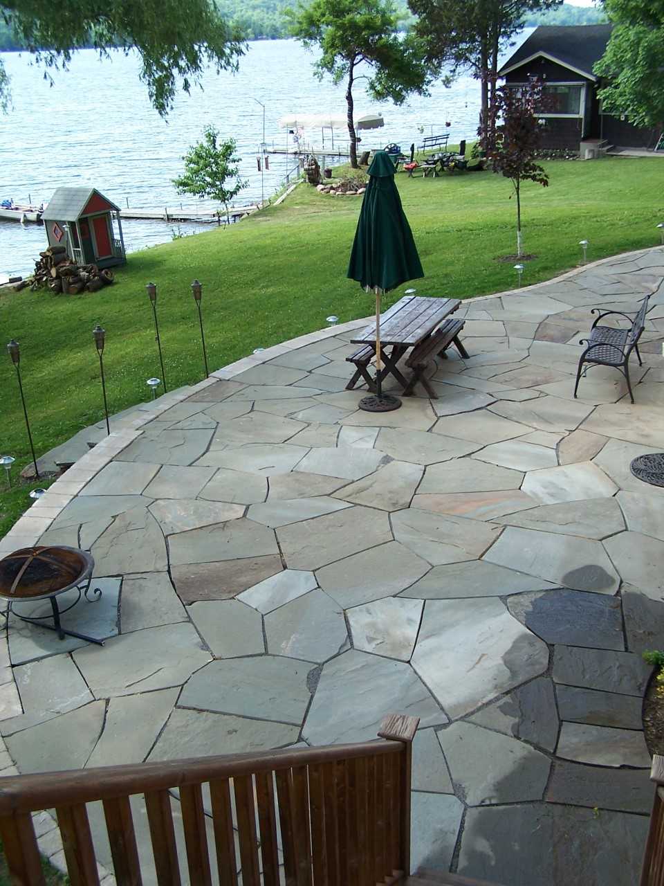 Flagstone Patio by Broccolo Tree and Lawn Care